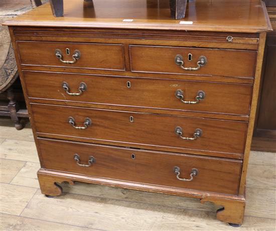 A Georgian mahogany chest, with brushing slide, W.96cm